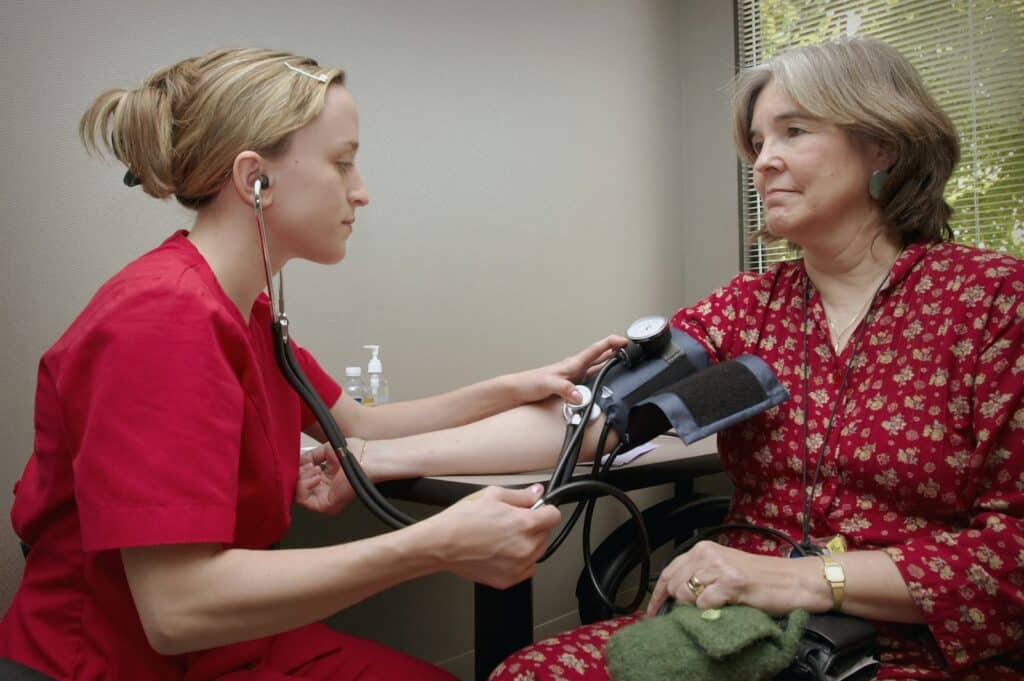 Clinician examining a patient during cancer screening at Integria Precision Medicine
