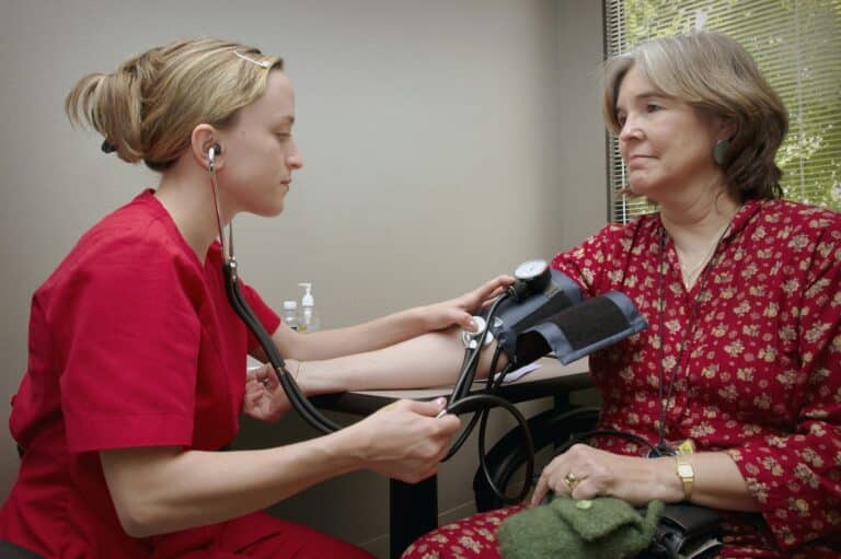 Clinician examining a patient during cancer screening at Integria Precision Medicine