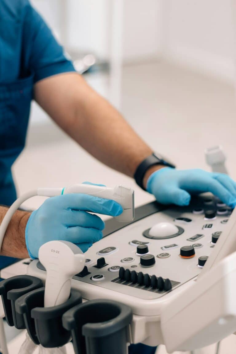 Sonographer performing a carotid ultrasound for CIMT testing at Integria Precision Medicine